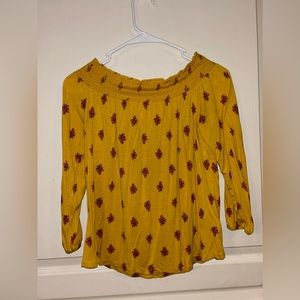 Women’s off the shoulder blouse.